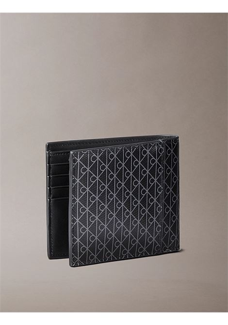 Portafoglio a libro con logo monogramma all-over e pochette portamonete CALVIN KLEIN | LV04D1085GUB1